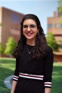 A three quarter portrait of Meredith on the Library green.